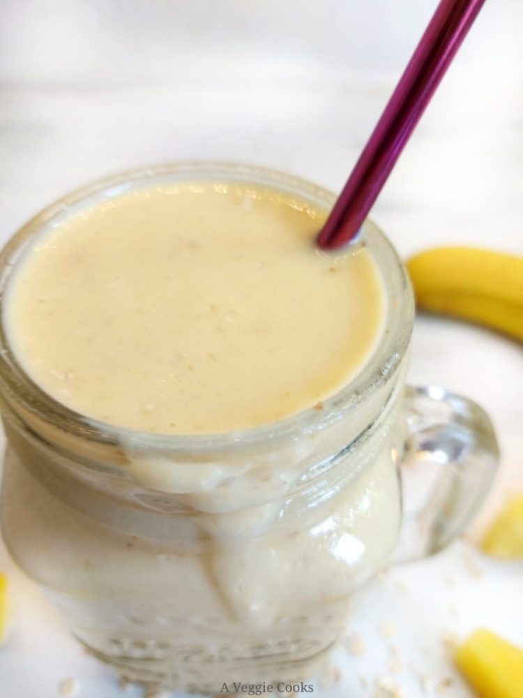 Glass containing mango and Pineapple Smoothie