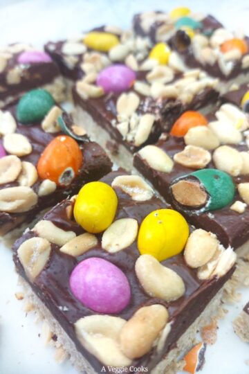 Vegan chocolate bars topped with salted peanuts and candied peanuts