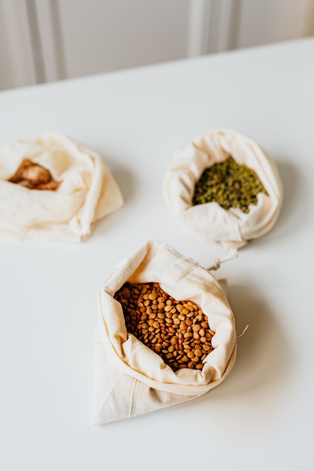 Lentils in cloth bags on a table