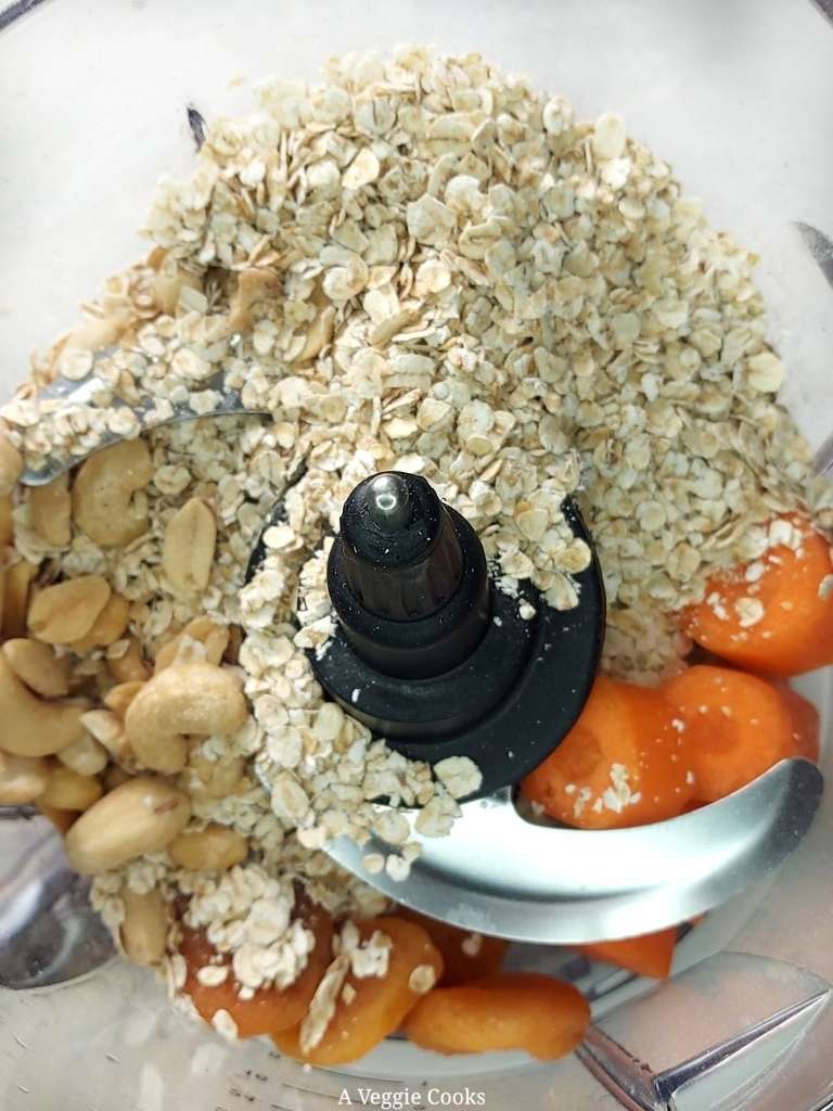 Ingredients for apricot energy balls in a food processor 